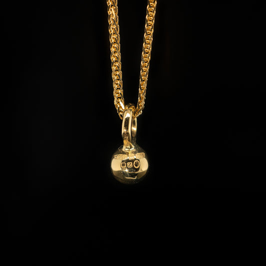 Amora ball with Ruby in Yellow Gold