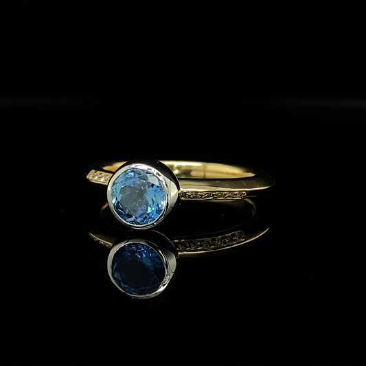 Aquamarine Saturn Ring in Yellow Gold