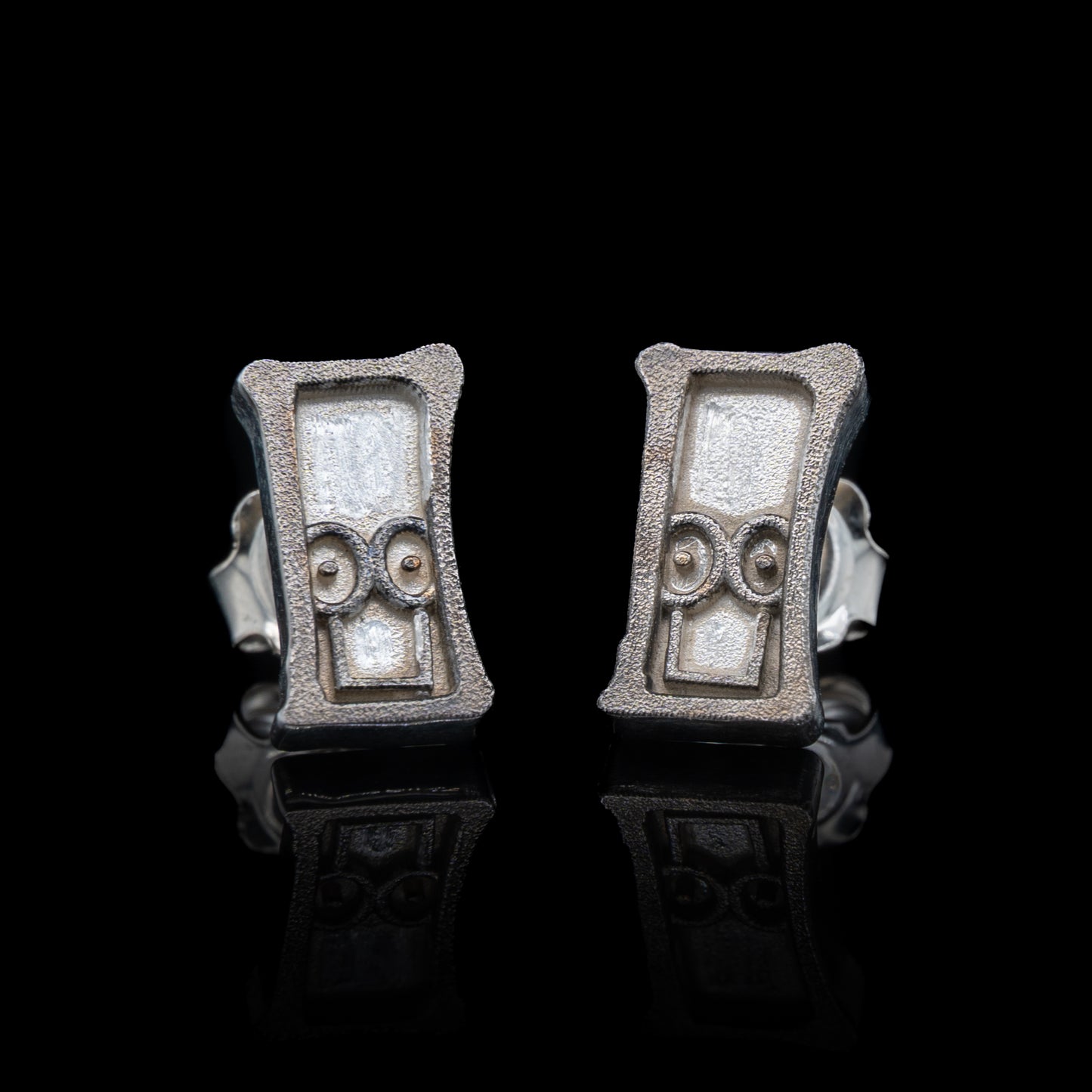 Everyman Smile Studs in Silver & Black Rhodium
