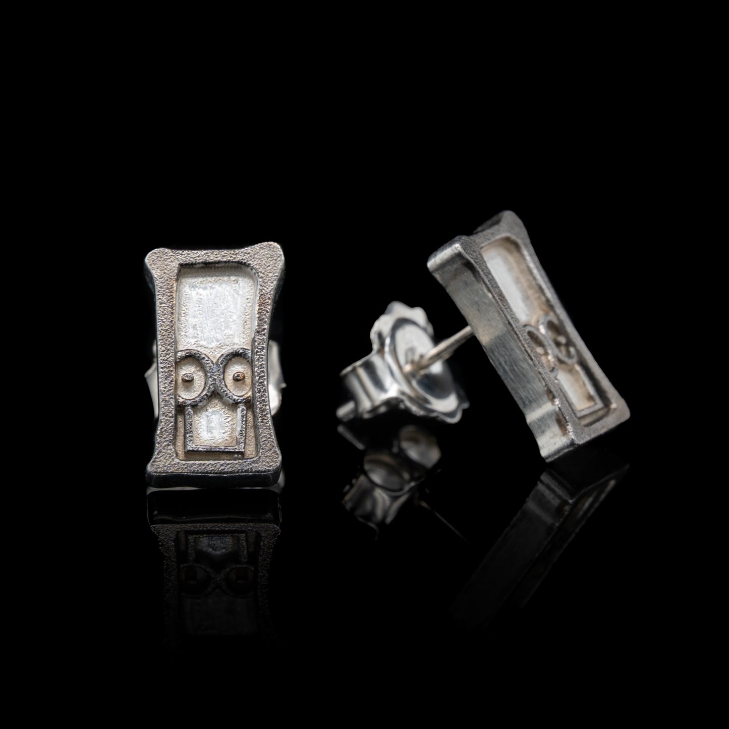 Everyman Smile Studs in Silver & Black Rhodium