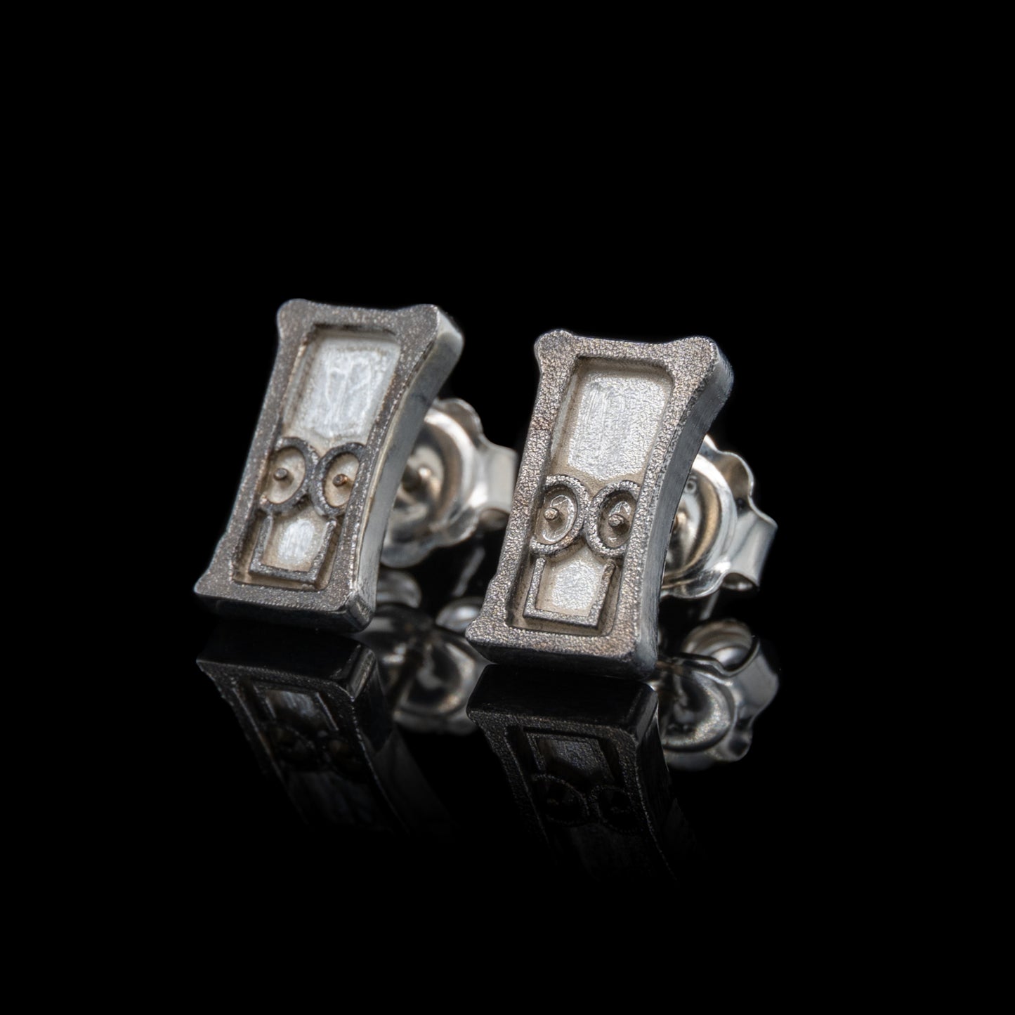 Everyman Smile Studs in Silver & Black Rhodium