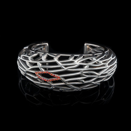 Domed Skeleton Cuff with Orange Sapphire